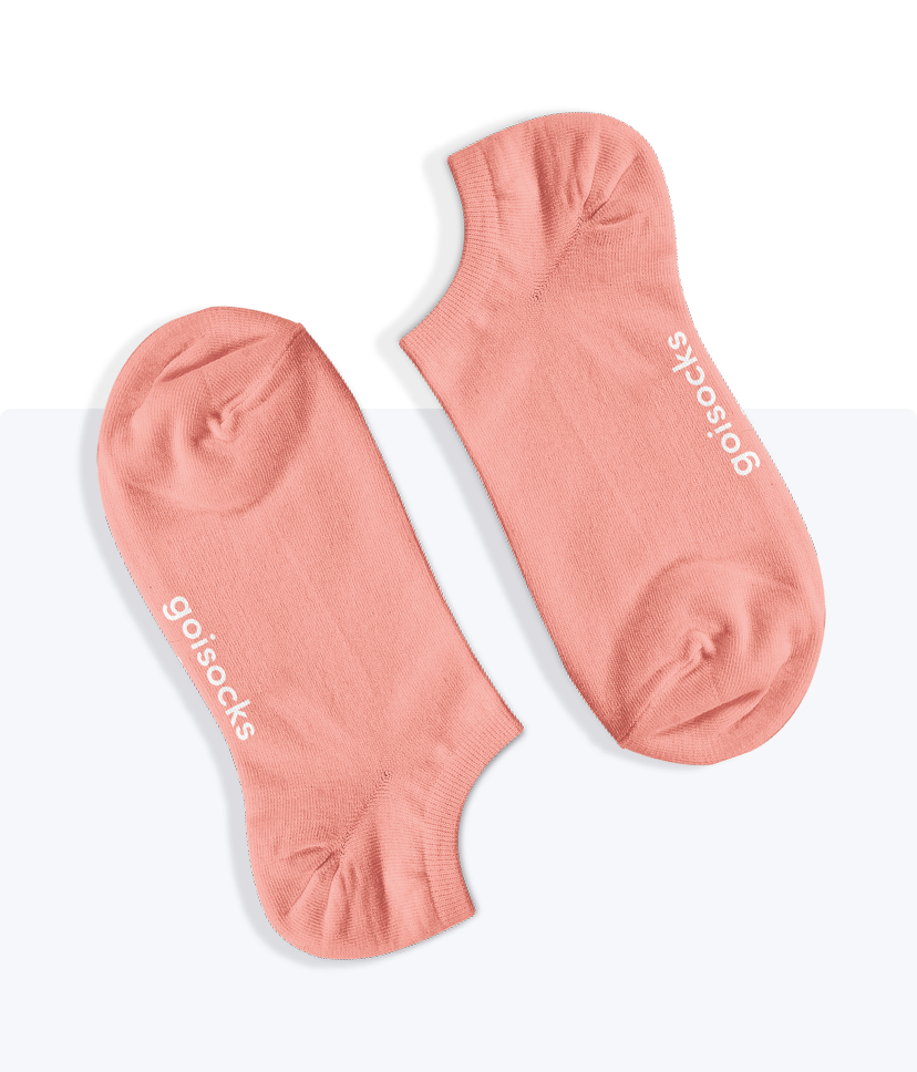 Egy pár Goisocks Bokazokni barackvirág színben.