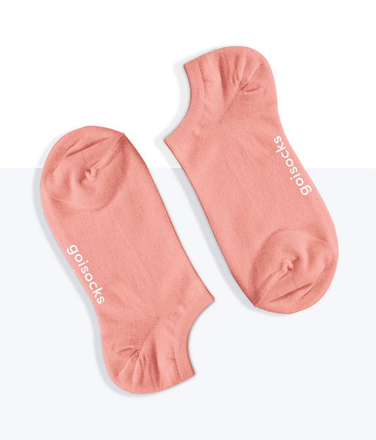 Egy pár egyszínű Barackvirág Goisocks bokazokni.