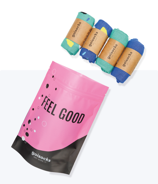 Goisocks Gyerek bokazokni, Csodás kék és Páva Zöld 4 darabos csomag gurigákban és rózsaszín zacskó, Feel Good felirattal.